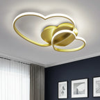 Heart LED flush mount ceiling light with interlocking gold frame and glowing inner ring