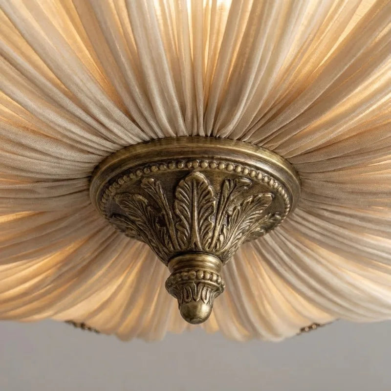 Antique bronze canopy and finial with pleated fabric round shade