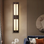 Black vertical wall light sconce with two frosted glass strip sections in a long frame
