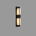 Black vertical wall light sconce with frosted glass strip panels in a long frame