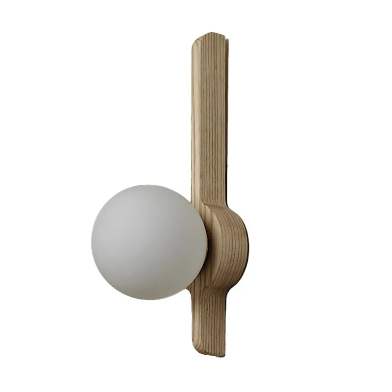 Single wall globe sconce with opal sphere and light wood vertical arm