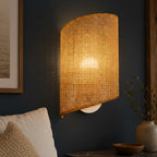 Bamboo curved cylinder wall light with grid-weave fabric shade and round backplate