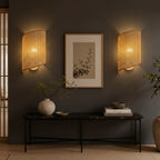 Pair of bamboo curved cylinder wall sconces with grid-weave shades, warm glow