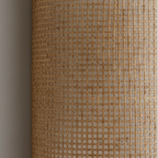 Bamboo grid-weave shade for a curved cylinder wall light, textured pattern