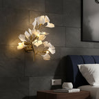 Gold and white ginkgo leaf wall light with glowing acrylic petals, wall mounted