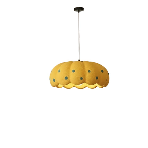 Yellow pumpkin-style pendant light with scalloped fabric shade and blue dot pattern