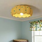 Yellow dome flush-mount ceiling light with teal dots and scalloped rim