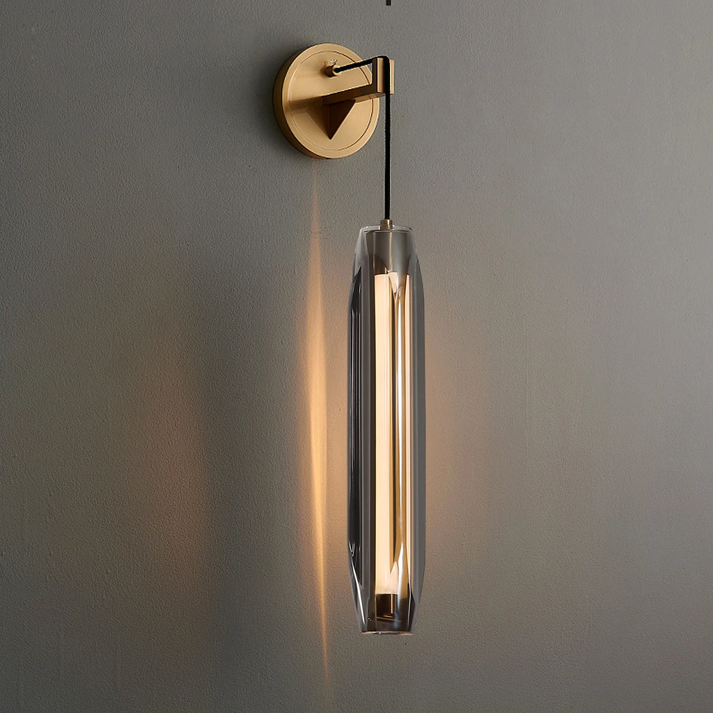 Brass round wall mount tubular glass sconce with clear vertical glass tube