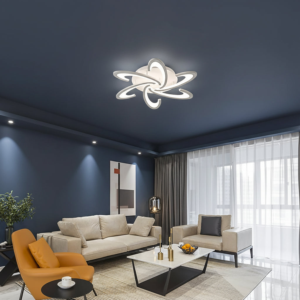 White acrylic petal LED flush mount ceiling light centered on the ceiling