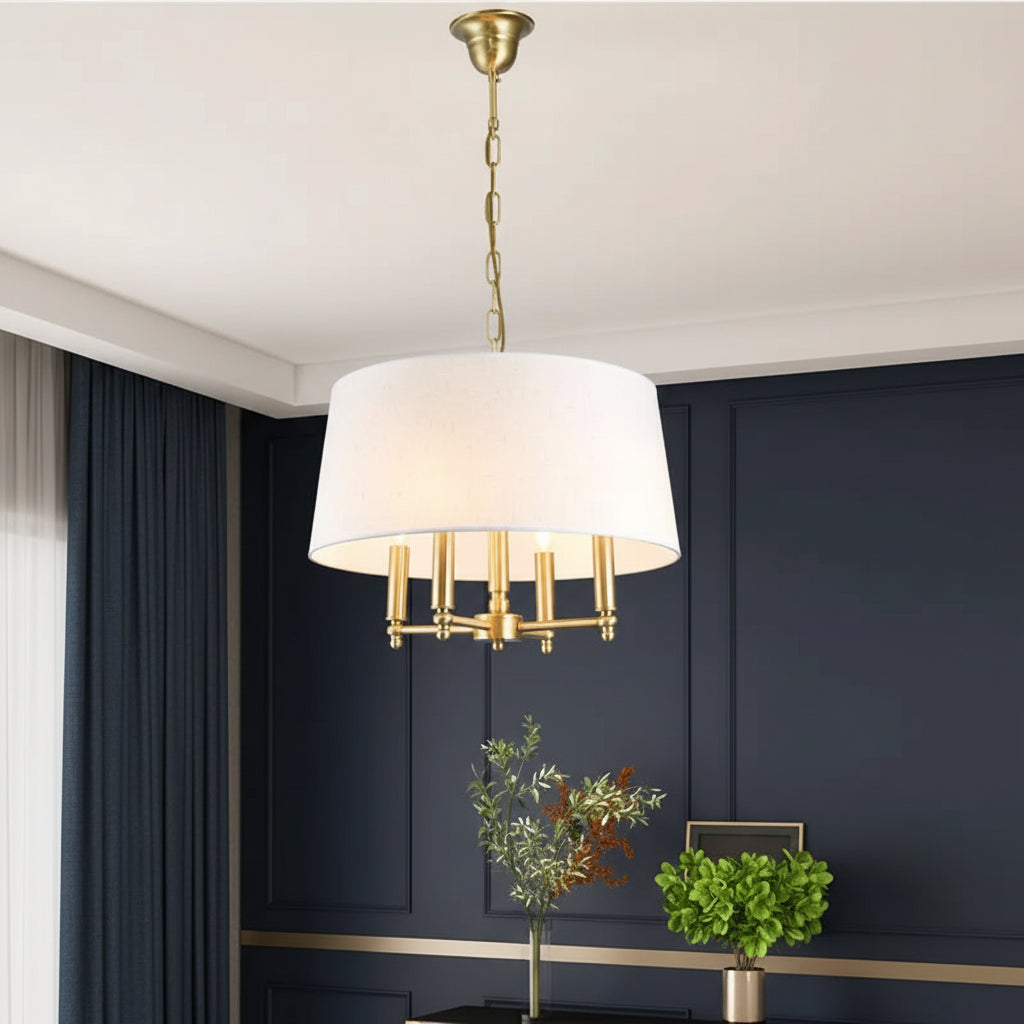 Fabric drum pendant light with white shade and gold multi-light candle-style frame