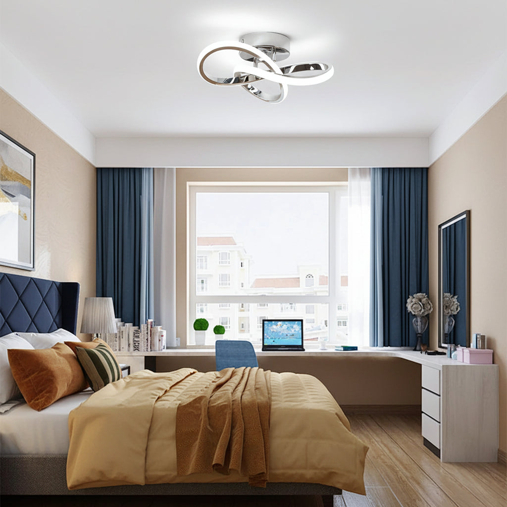 Chrome curved loop flush mount ceiling light with interlocking ring strips overhead