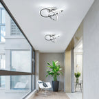 Chrome interlocking loop ceiling light fixture with curved ring strips, flush mount