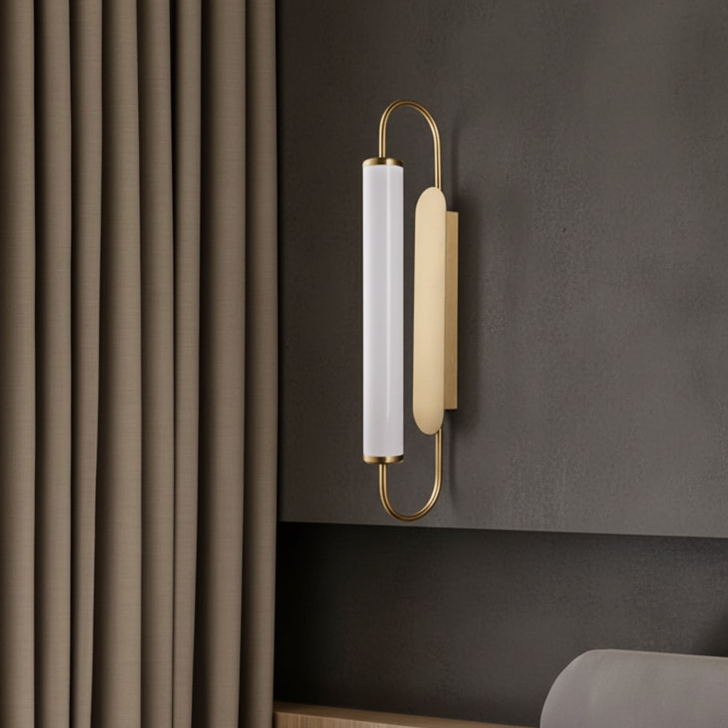 Tubular opal wall sconce with gold metal frame and cylindrical glass shade, warm light