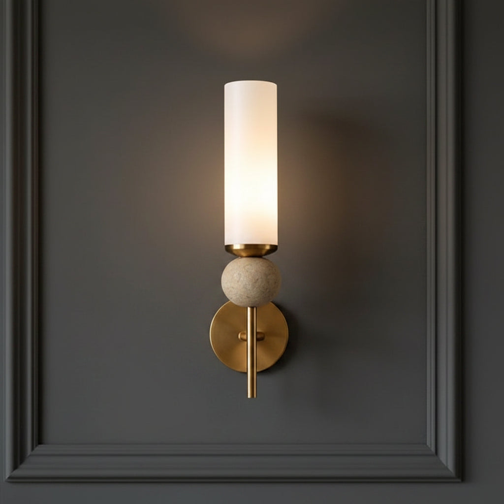 Zyle travertine cylindrical wall sconce with brass backplate and stone globe base