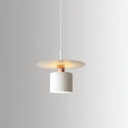 White cylindrical pendant light with warm glowing bulb and round canopy top
