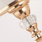 Gold sconce fittings with faceted crystal teardrop and beaded pull chain