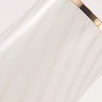 White fabric drum lamp shade with subtle swirl texture