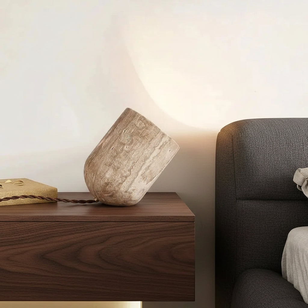 Travertine cylindrical table lamp, slanted beige stone base with braided cord