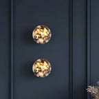 Marble cylinder wall lights with two round stone shades