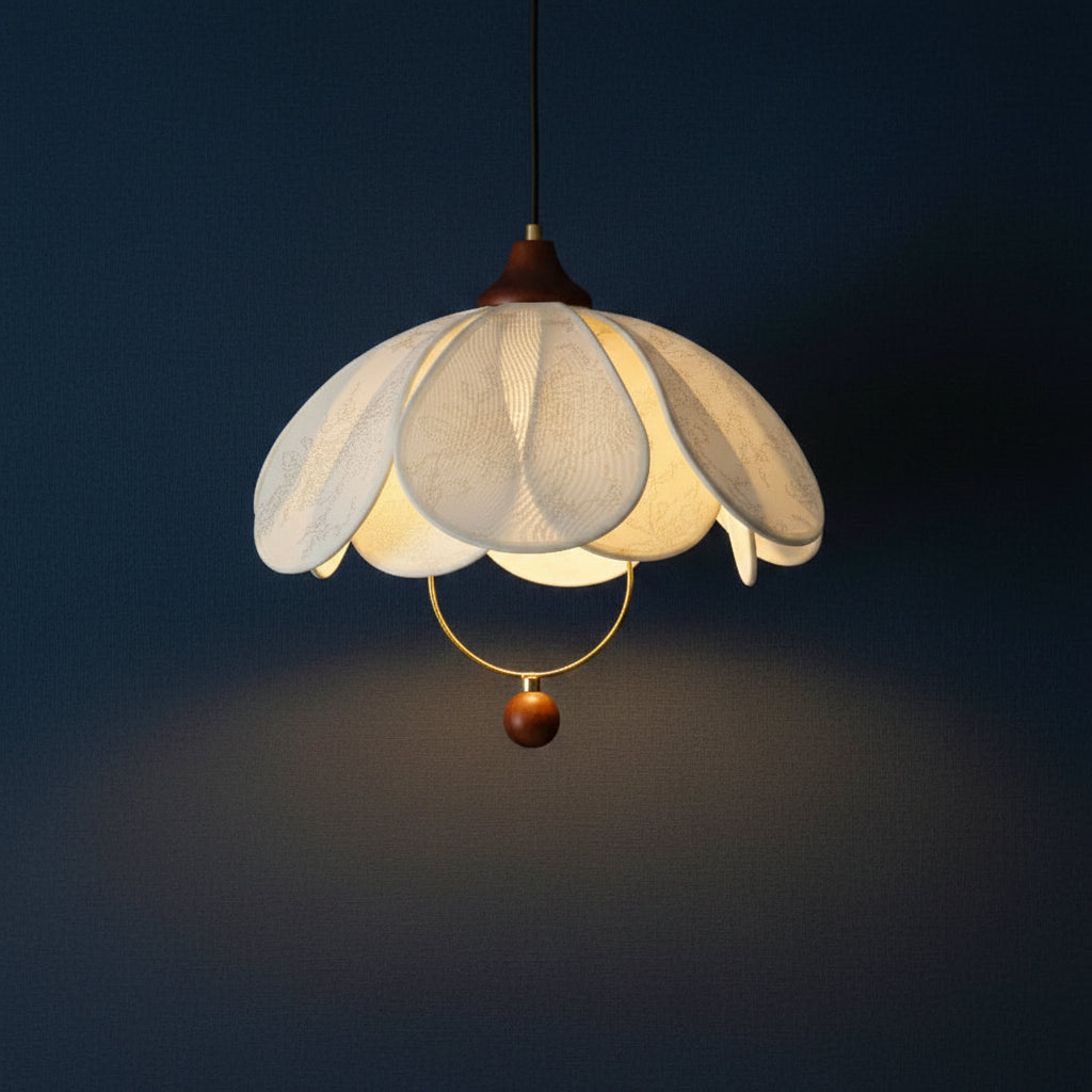Fabric petal pendant light with layered cream shade, gold ring, and brown finial