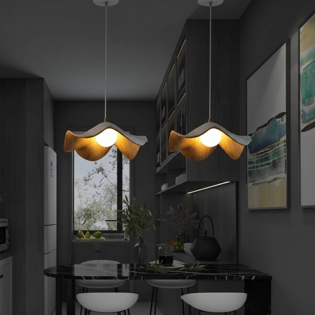 Curved wooden pendant light with warm glowing bulb in a modern hallway