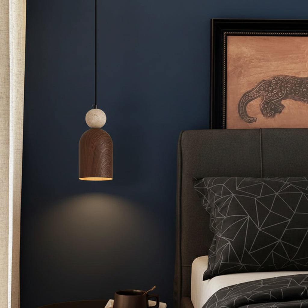 Stacked drop pendant: beige stone sphere above a brown cylindrical shade with warm metal rim