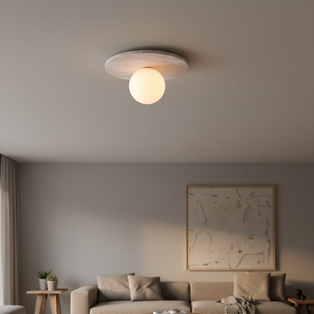 Round flush mount ceiling light with frosted globe shade and stone-like canopy