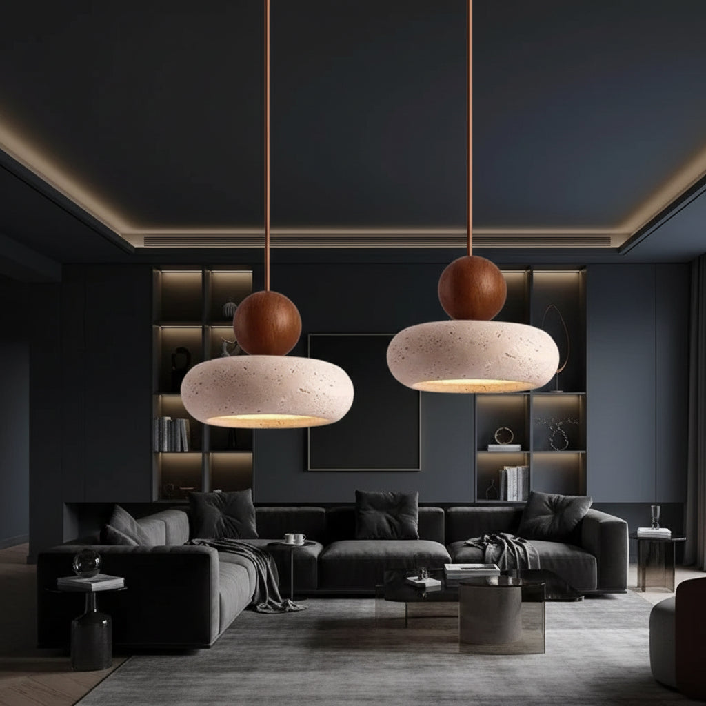 Stacked pendant light pair with speckled travertine dome shades and walnut wood caps