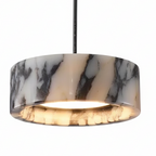 White-and-black marble drum lamp shade with glowing inner ring