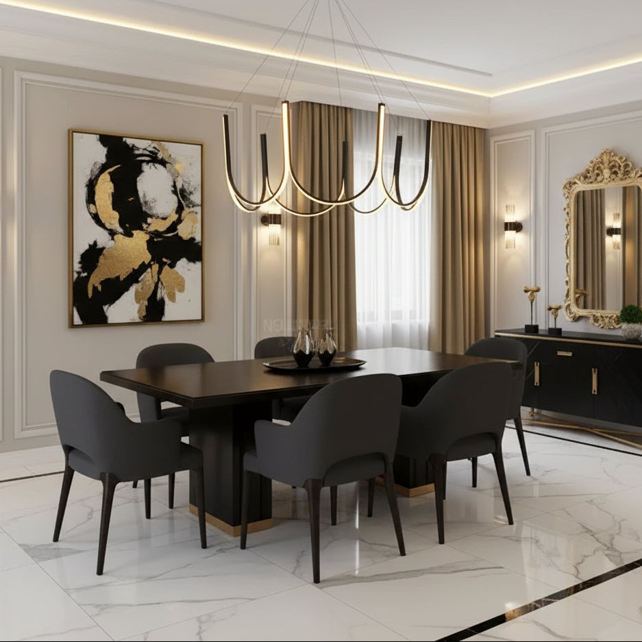 Black U-shaped wave chandelier hanging above dining table with ribbon arms
