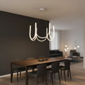White U-shaped wave chandelier with ribbon arms and 6 candle-style bulbs