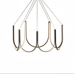 Gold and black U-shaped chandelier with ribbon arms and 6 candle-style bulbs