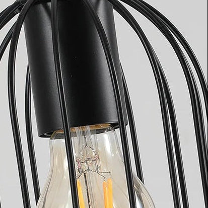 Close-up of wire cylinder cage over clear glass bulb with black metal frame