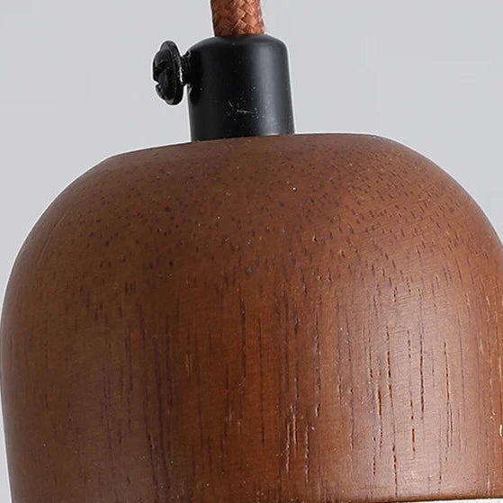 Brown wooden pendant bulb cover with black top hardware and braided cord