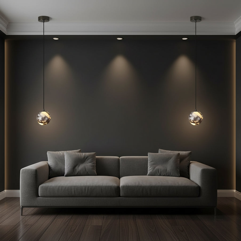 Cluster of marble glass orb pendant lights with black cords