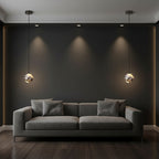 Cluster of marble glass orb pendant lights with black cords