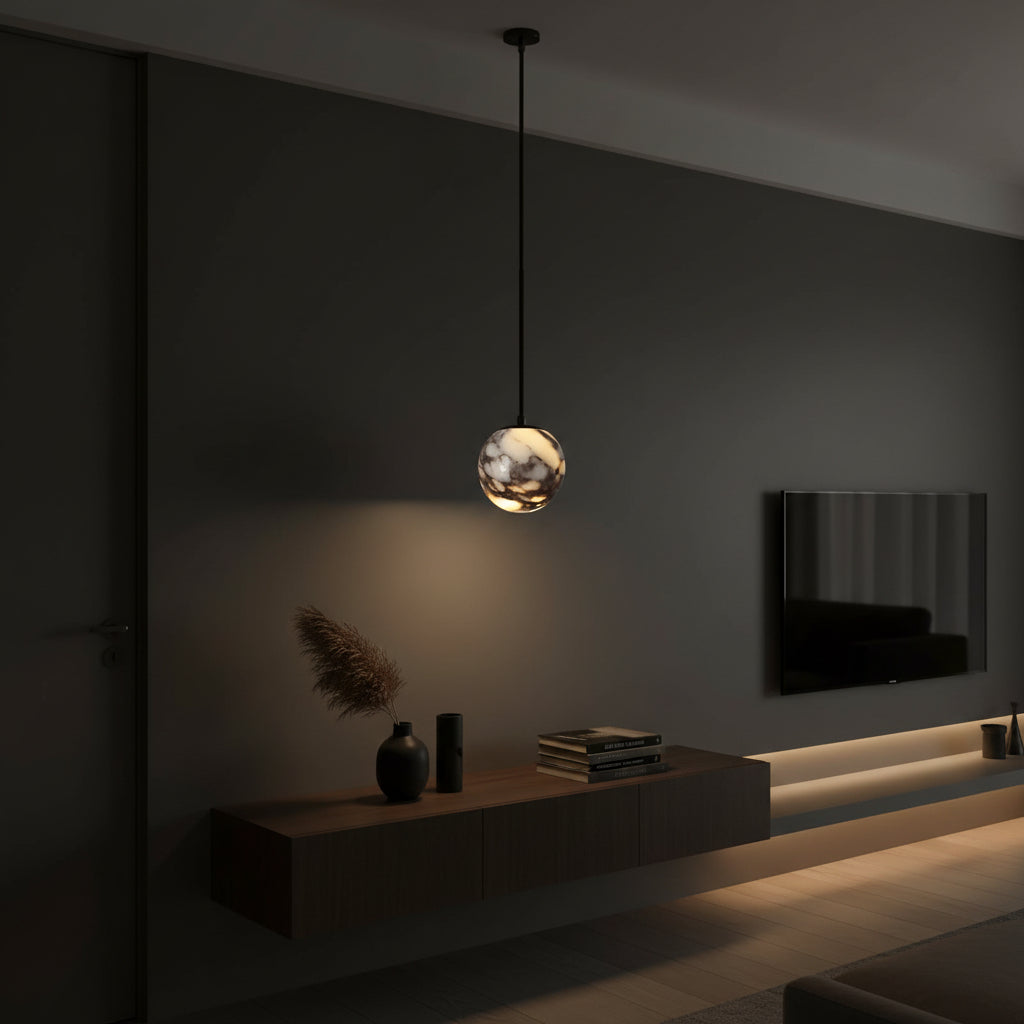Marble glass orb pendant light with black cord and globe shade