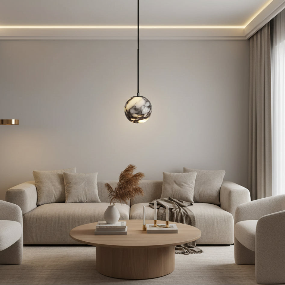 Single marble globe pendant light on black cord, white and amber veined glass
