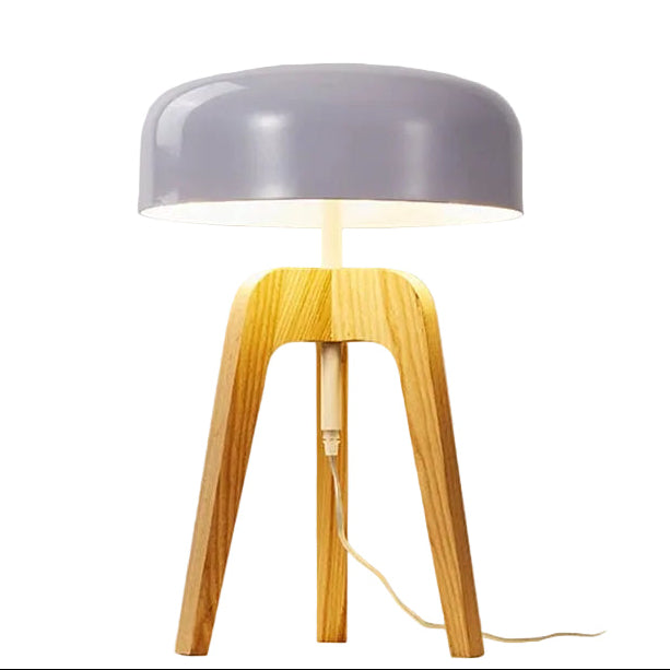Tripod table lamp with gray dome shade and light wood three-leg base