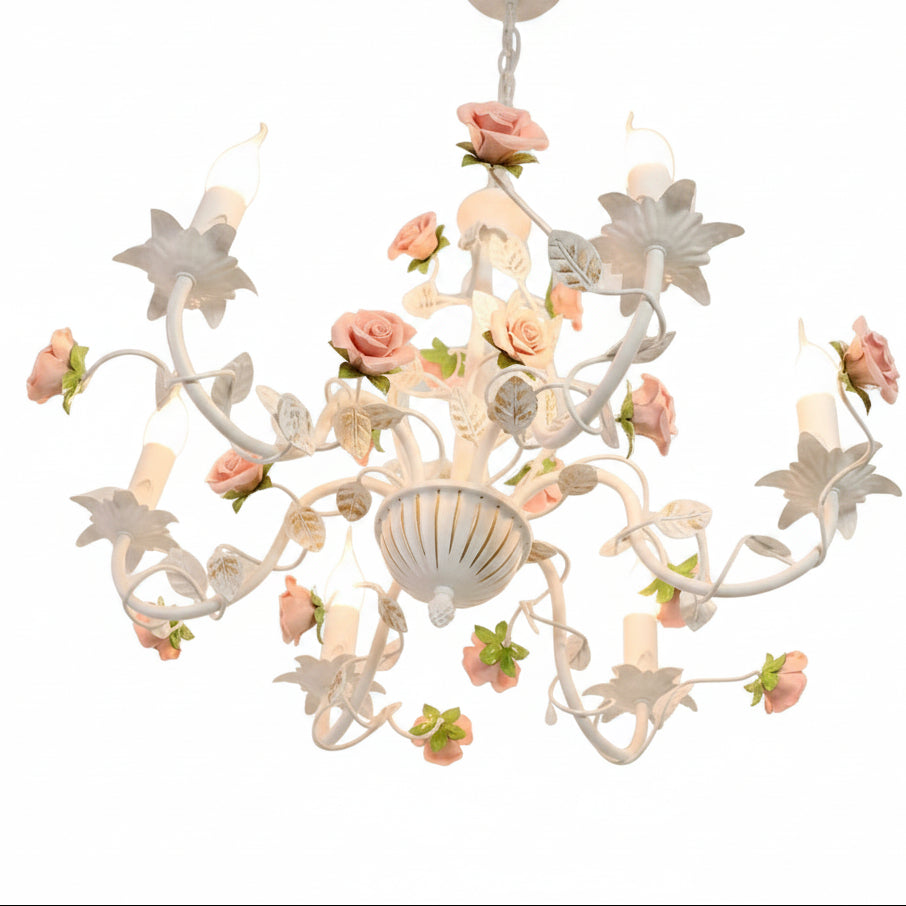 Floral arm chandelier with white curved arms, pink and green rose decorations