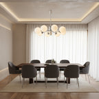 Multi-arm globe chandelier with chrome stem and frosted glass globes