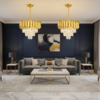 Gold round chandelier with vertical crystal drops and tiered barrel-style shades