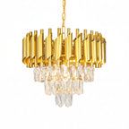 Gold crystal chandelier with drum-shaped metal shades and hanging crystal strands