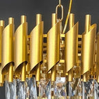 Close-up of gold chandelier drum shades with clear crystal fringe