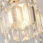 Faceted clear crystal glass shades for linear ceiling light, close-up