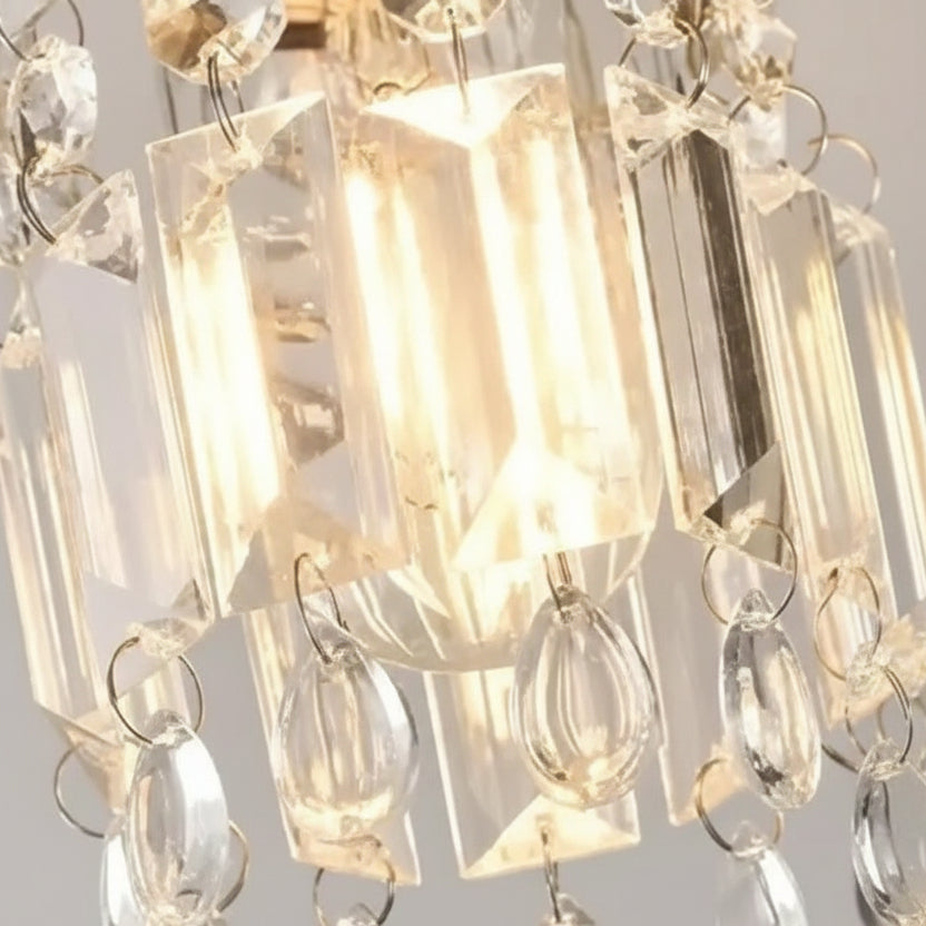 Faceted clear crystal glass shades for linear ceiling light, close-up