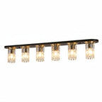 Linear flush mount ceiling light with dark bar and row of clear glass bulb shades