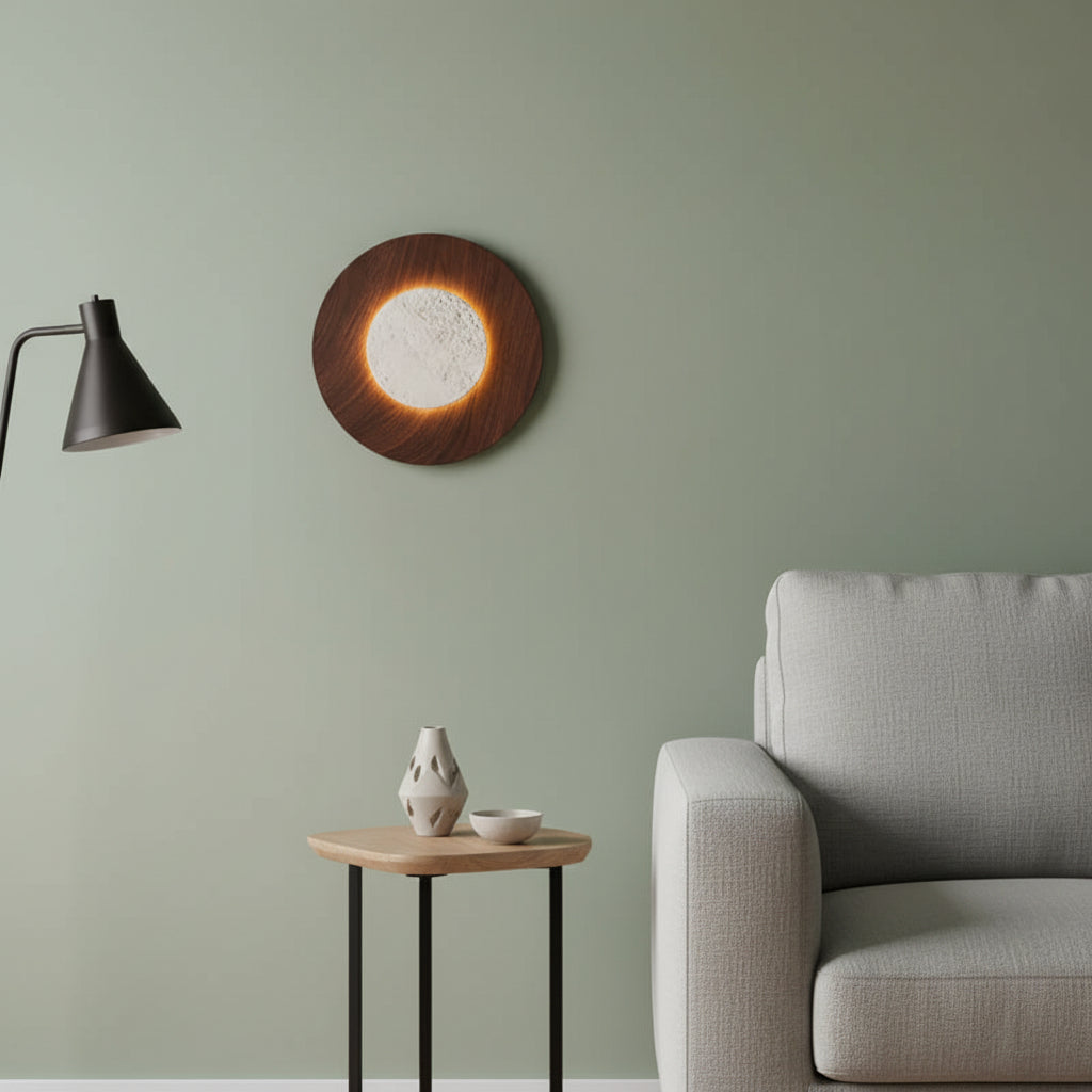 Circular brown wall light sconce with glowing inner travertine disk for wall mounting
