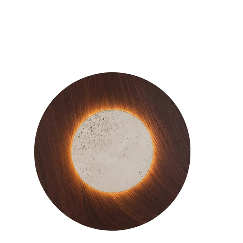 Round wall light sconce with brown frame and backlit travertine center disk