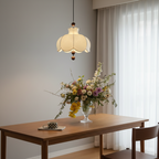 Cream scalloped fabric pendant light with brown wooden ball accents and hanging cord